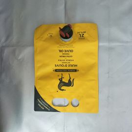 3 λίτρα κίτρινων τυπωμένων στάσεων επάνω στη σακούλα με τους σωλήνες/βύσμα για το χυμό/το έλαιο/το κρασί