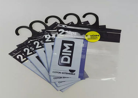 Ανακυκλωμένες ντύνοντας πλαστικές τσάντες κρεμαστρών, πολυ τσάντα PE OPP με το γάντζο